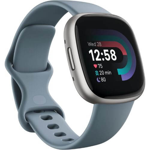 Fitbit Versa 4 smartwatch face on a senior's wrist